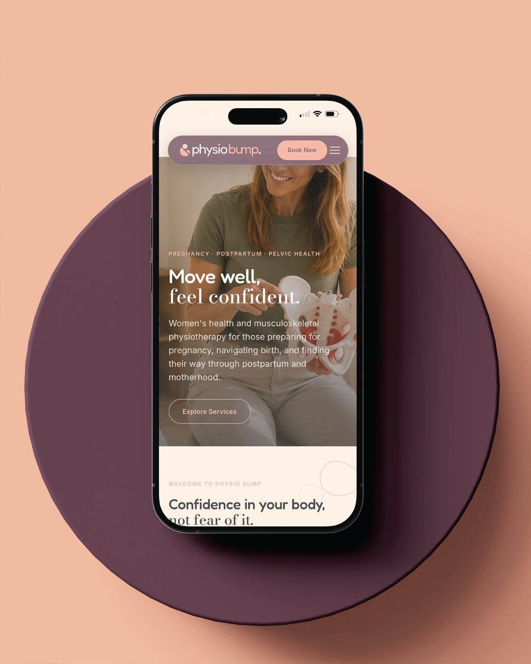 Physio Bump website shown on a phone